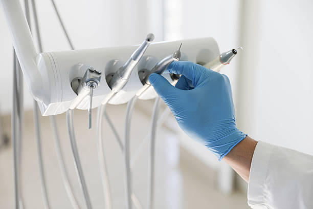 Professional Tooth Extraction technician working in St. James, MO